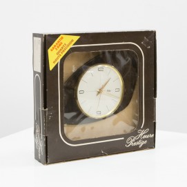 Horloge moderniste Odo en Formica et laiton