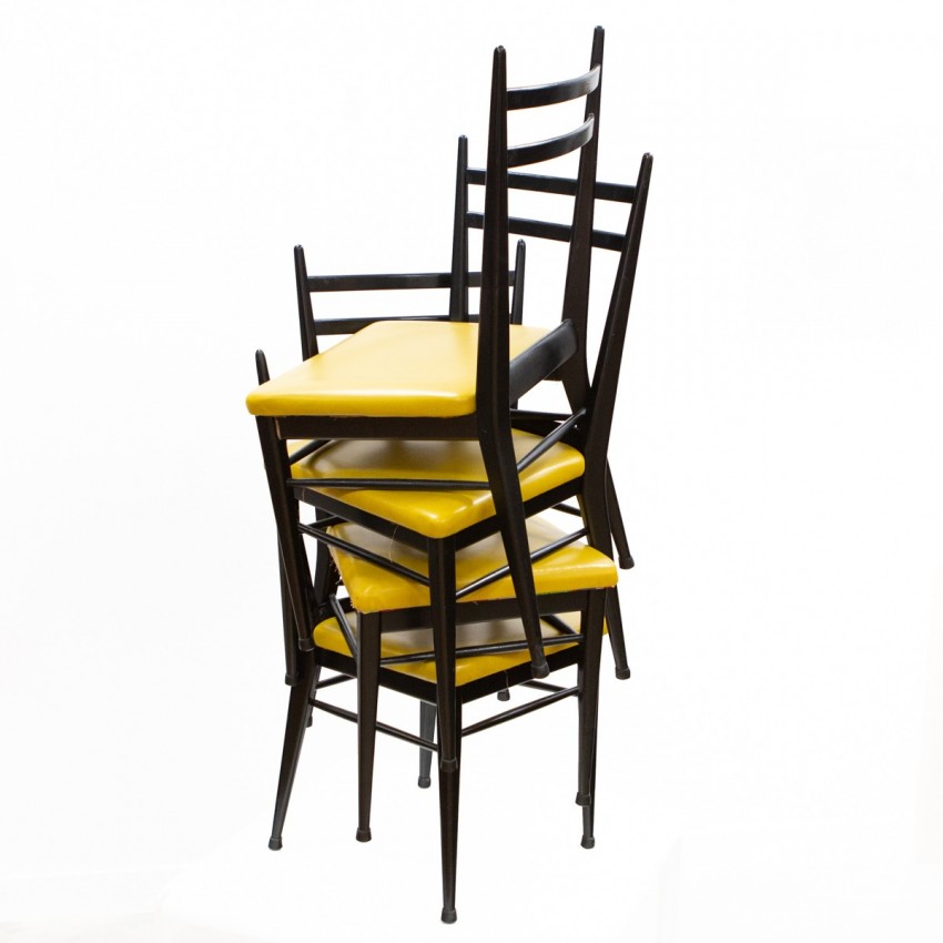 Chaises en bois et Skaï jaune d'Henri Lancel pour MAF